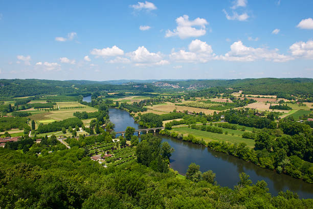 Dordogne,France-06 13 2014:Panoramic view of the Dordogne valley and river surrounded by forests,meadows and agricultural fields.