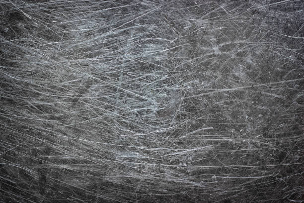 istock Gray iron plate with scratches, metal texture with chrome gloss 1143166131