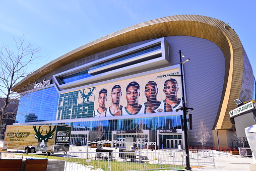 The Milwaukee Bucks Fiserv Forum Arena readied for the playoffs with posters applied to facade.