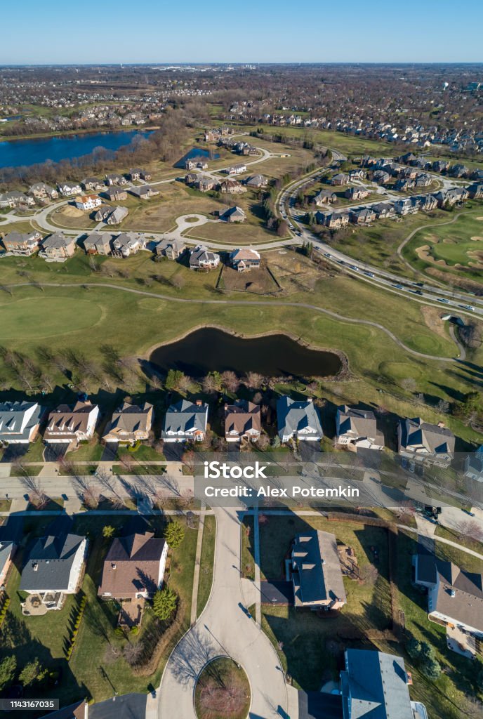Drone aerial view of the residential neighborhood Libertyville, Vernon Hills, Chicago, Illinois.The vertical XXXL stitched panorama. The residential neighborhood in Chicago, Illinois, USA, at the spring early morning Illinois Stock Photo
