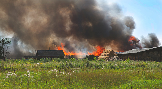 a terrible fire of a hay warehouse in the village