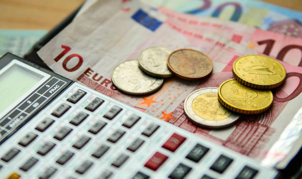 istock calculator and money on the table 1143167053