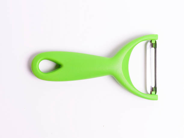 istock green potato peeler 1143167058
