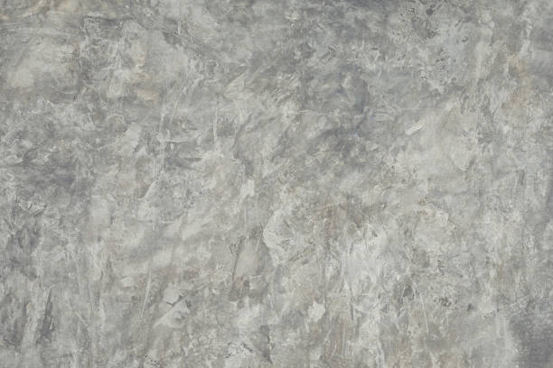 istock Gray Wall Cement Paint Texture background plaster paint rough with vignette High resolution background for design blackdrop or overlay 1143167917