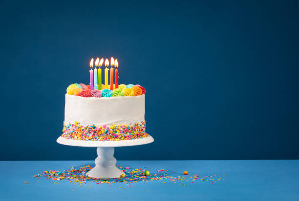 istock Colorful Birthday Cake over Blue 1143168751