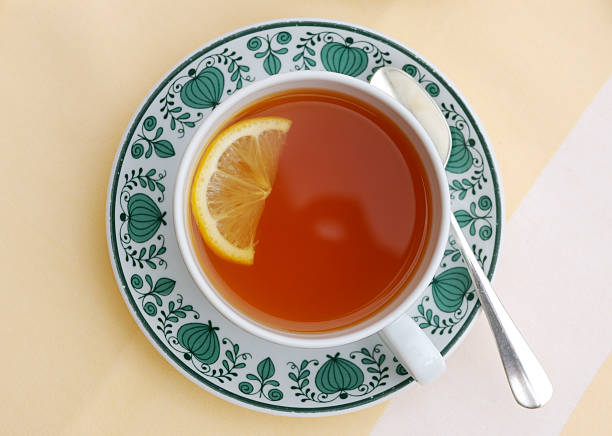 té con limón - nobody tablecloth cup saucer fotografías e imágenes de stock