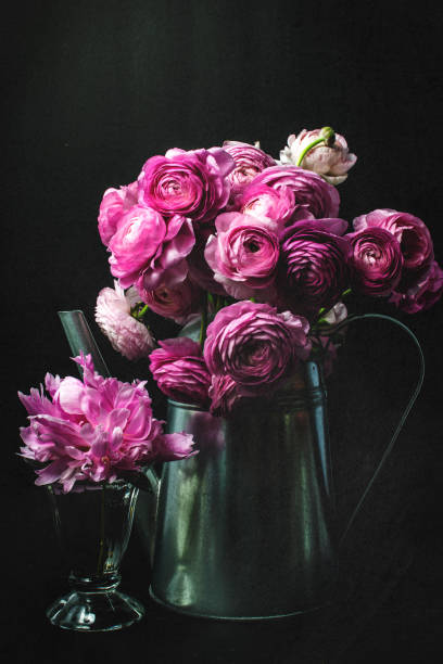 istock Peony Flower and Ranunculus Bouquet in Watering Can 1143169436