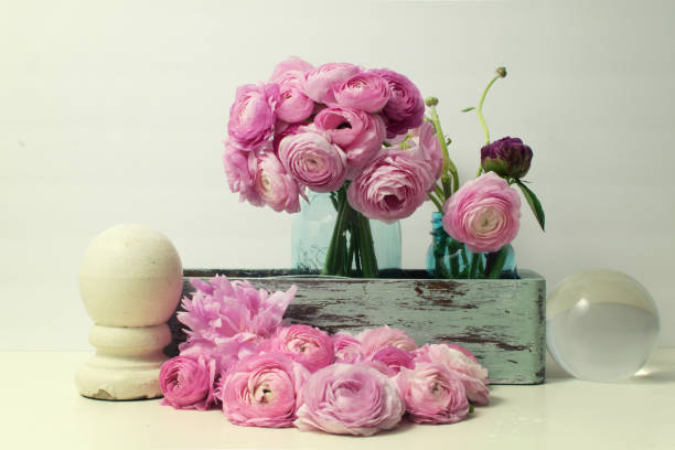 istock Rustic Still Life Mixed Flowers Ranunculus Peony Carnation 1143169619