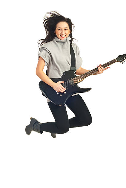 istock Jumping guitarist woman 114316985