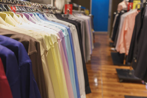 istock Clothes hanging on a hanger in a store. Man clothes. 1143172905