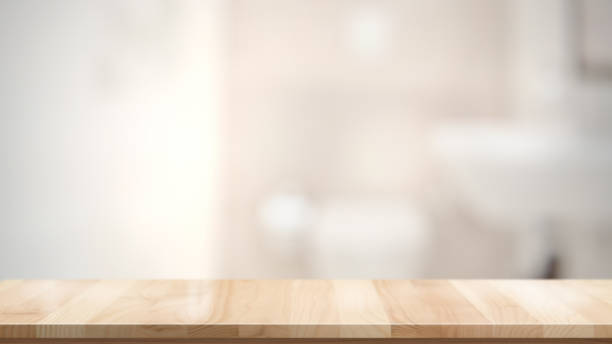 istock Empty brown wooden table in bathroom for product display montage 1143177613