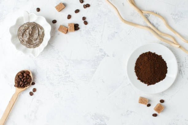 istock Spa treatment. Coffee organic sugar scrub on white background top view copyspace, nutrition wellness body scin care concept 1143179549