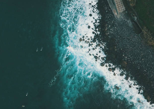 istock tenerife drone waves surfers blue oceans 1143181483