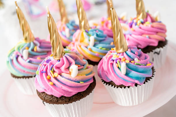 istock Unicorn cupcakes decorated with colorful buttercream icing and sprinkles. 1143184004