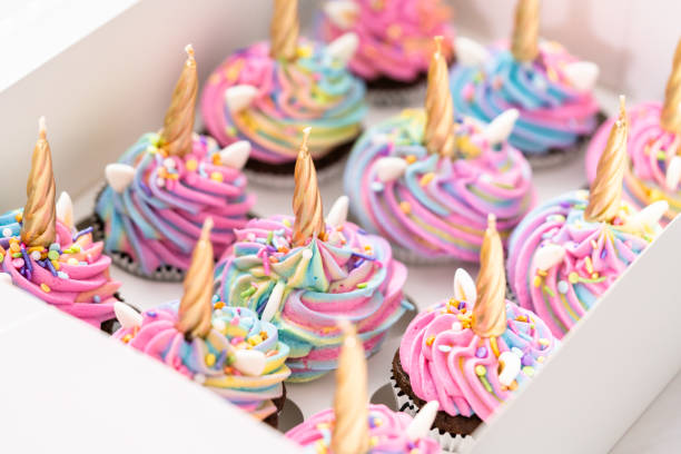 istock Unicorn cupcakes in a white cupcake box. 1143184032