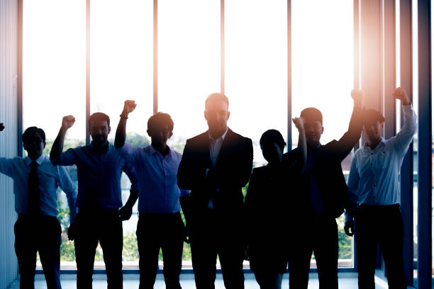 istock Silhouettes of successful business team 1143186625