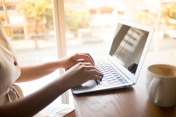 istock Young Beautiful Asian Women Using Laptop 1143186714