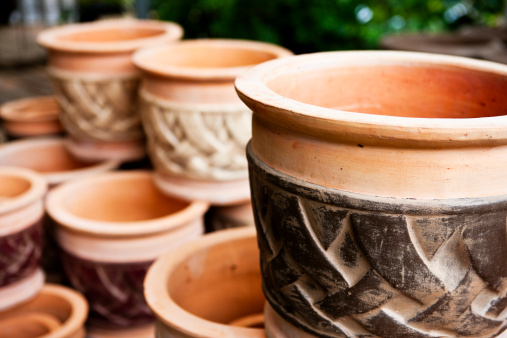 Close-up of charcoal-fired terracotta pot for side stove