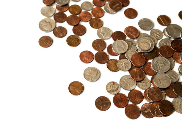 istock A pile of american cents scattered isolated on white 1143190818