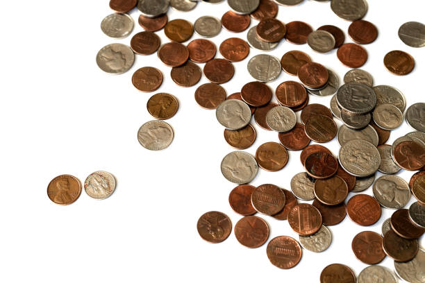 istock A pile of american cents scattered isolated on white 1143190820