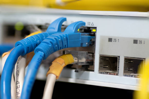 istock Network lan swicth hub with rj 45 cable. 1143202529