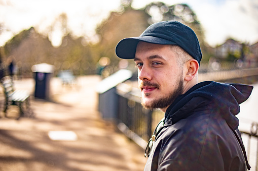 Portrait of Young Adult Man Outdoors.