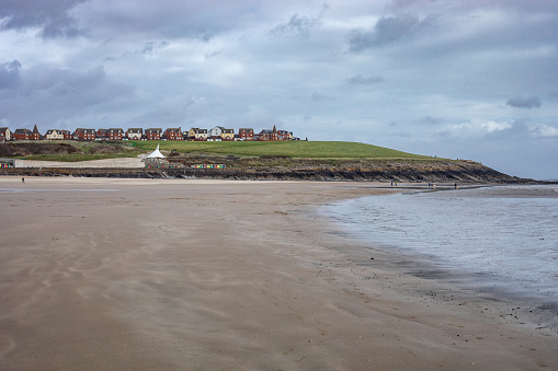 Sandy Beach Landscape in Whitmore Bay in Wales.