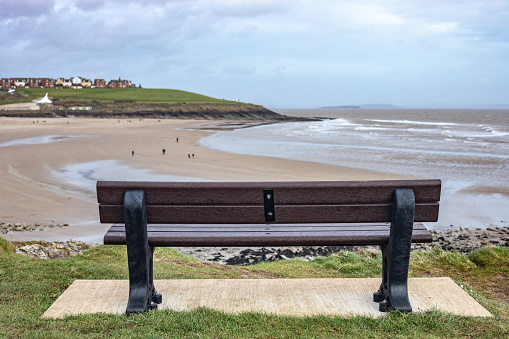 Empty Bench in Whitmore Bay in Wales.