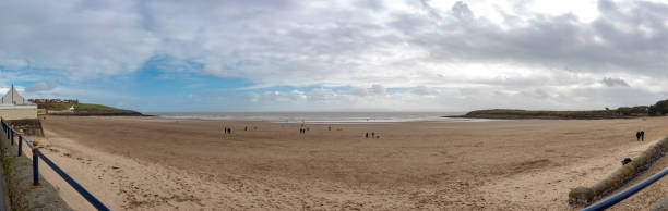 istock Sandy Beach During Low Tide in Whitmore Bay in Wales 1143204110