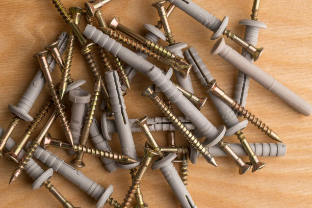istock Dowel for fixing building materials on wooden  background 1143204241