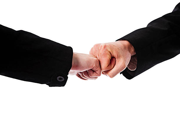 istock Business fist bump 114320880