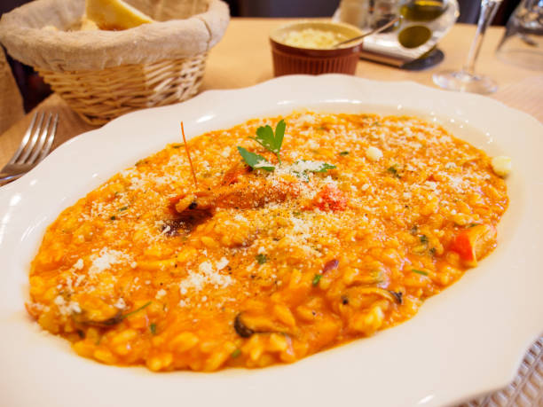 Seafood risotto with parmesan cheese, Paris, France stock photo