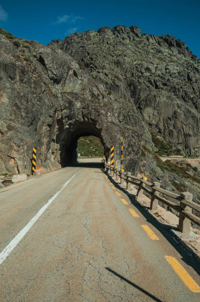 istock Close-up of asphalt on road with tunnel 1143212549