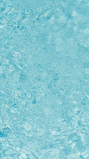 Transparent texture and background of pool water. Mobile wallpaper