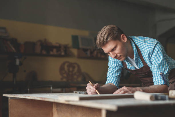 istock Young professional in the carpentry 1143214129