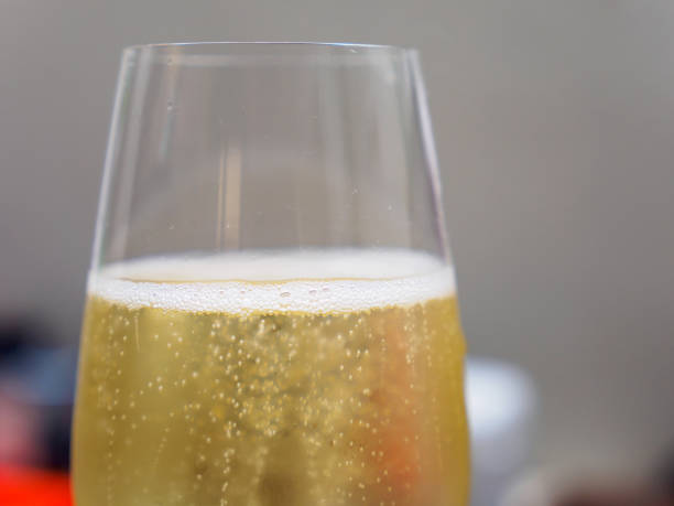 istock Champagne glass with multiple bubbles, macro detail 1143216489