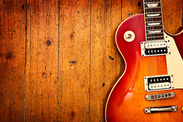 istock Electric guitar on wood 114322328