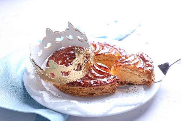 Galette des rois, French pie Galette des rois, french kingcake with a golden crown galette stock pictures, royalty-free photos & images