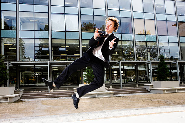 istock Businessman clicks his heels 114322481