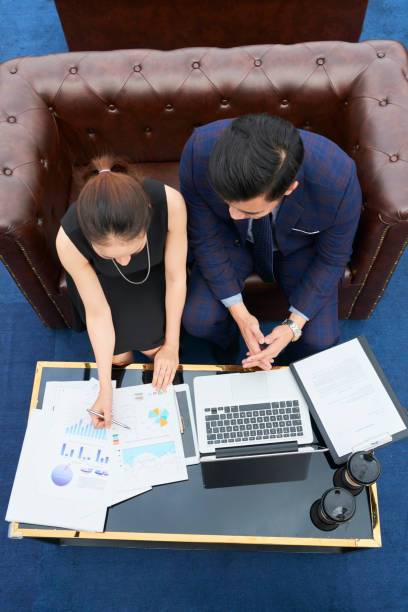istock Business people analyzing business charts 1143229469