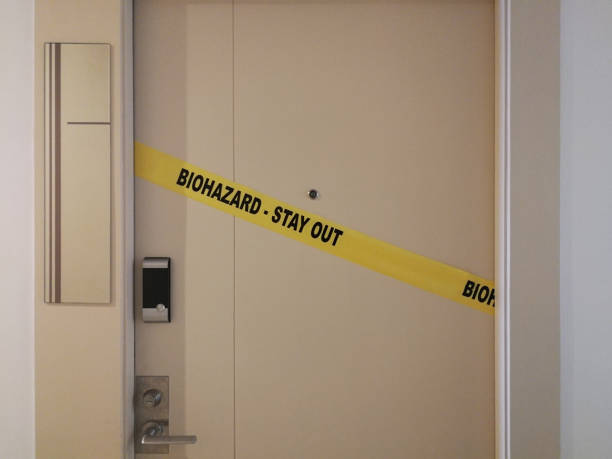 istock Biohazard Crime Scene Tape on Door 1143230023