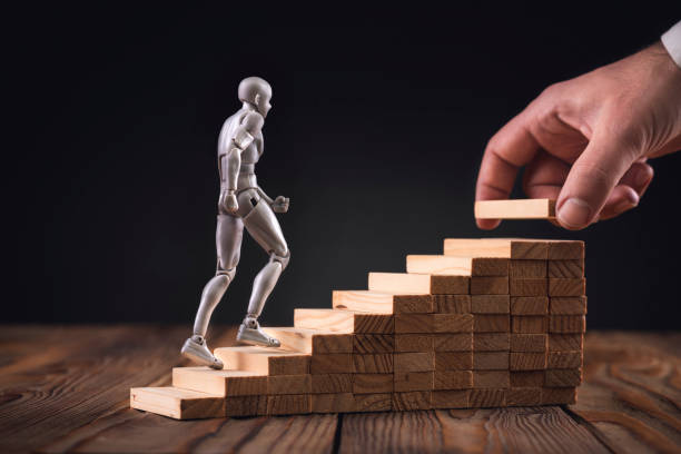 istock Career Planning Concept. Businessman Getting Help Achieving Goals. 1143233186