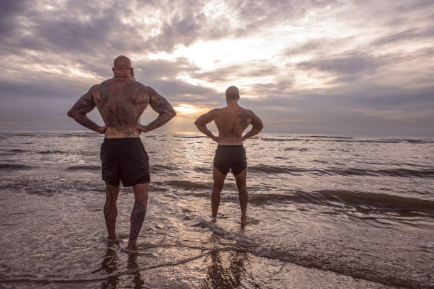 istock Tattooed Senior Man coaching young man During Workout 1143233248