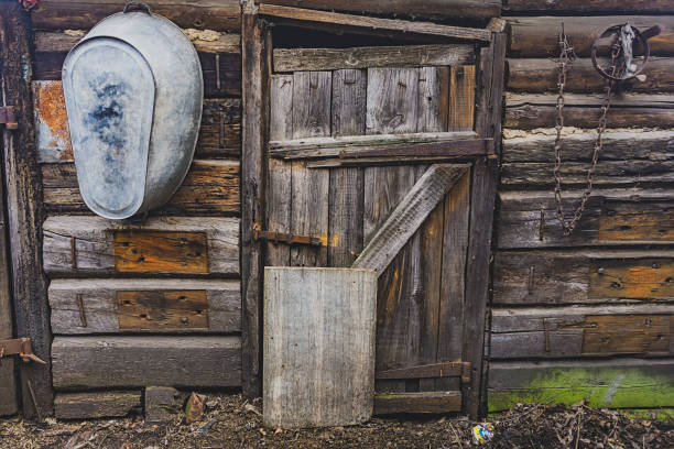 istock old wooden door of a collapsed barn. 1143233280