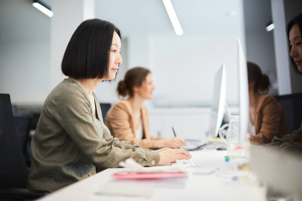 istock Business women working on a computer highly concentrated. 1143233362