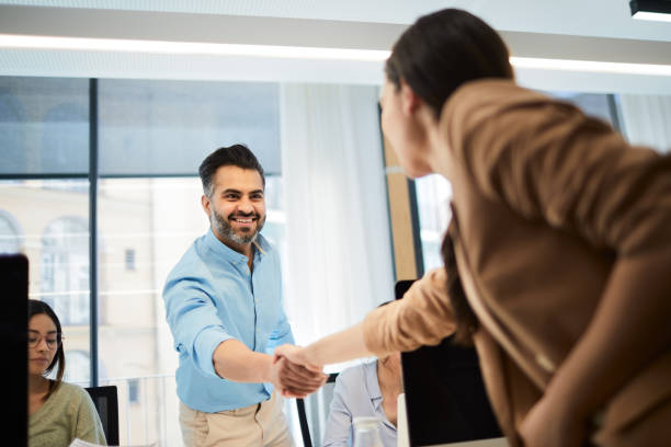 istock Business handshake at the office. 1143233393