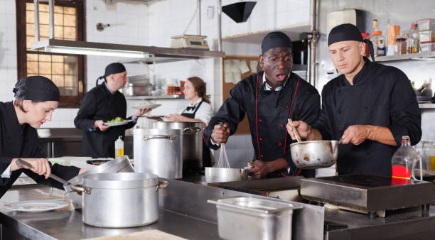 istock Professional male chef in kitchen of restaurant 1143234746