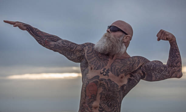 istock Tattooed Senior Man During Workout 1143234772