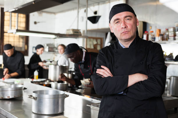 istock Professional male chef in kitchen of restaurant 1143234781