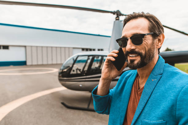 istock Happy bearded man talking on the phone and smiling 1143235655